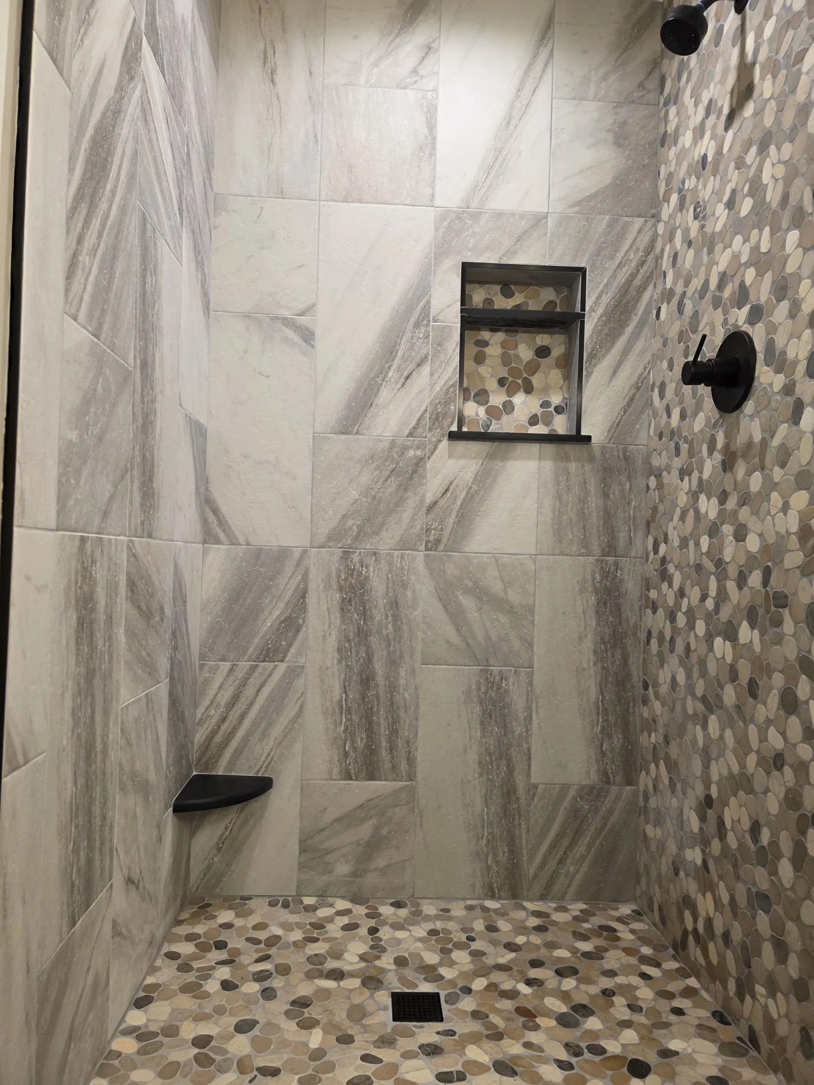 Riverstone & Tile Shower Remodel