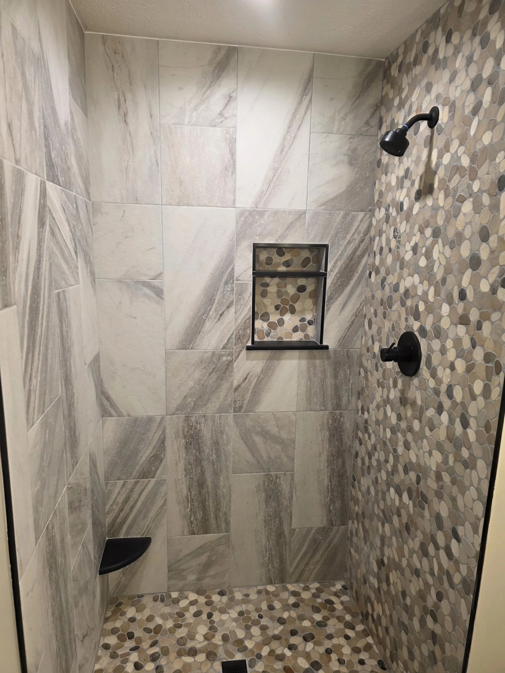Riverstone & Tile Shower Remodel