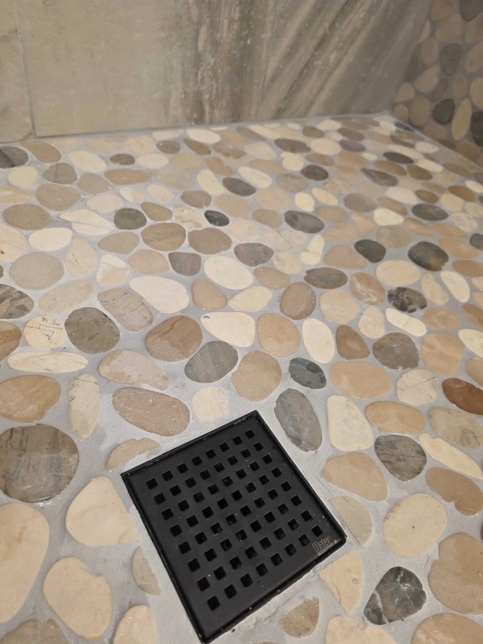 Riverstone & Tile Shower Remodel